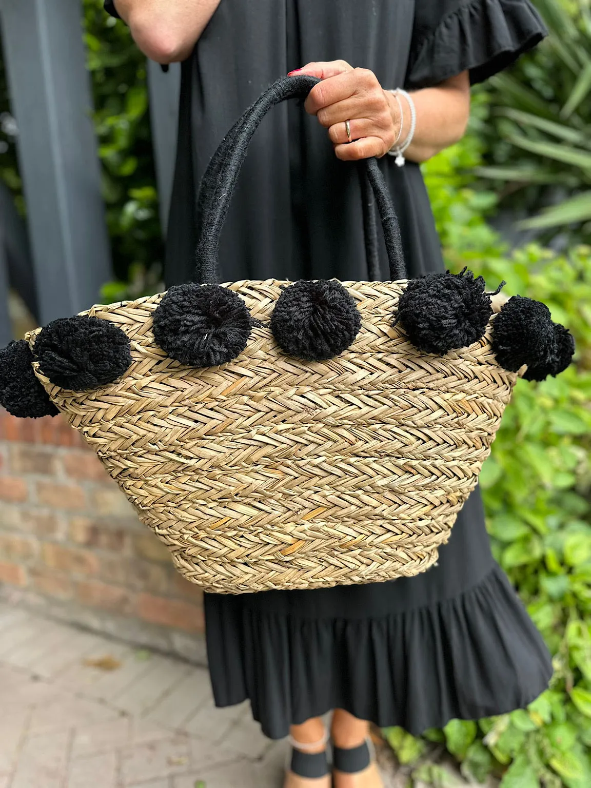 Black Pom Pom Weaved Straw Bag