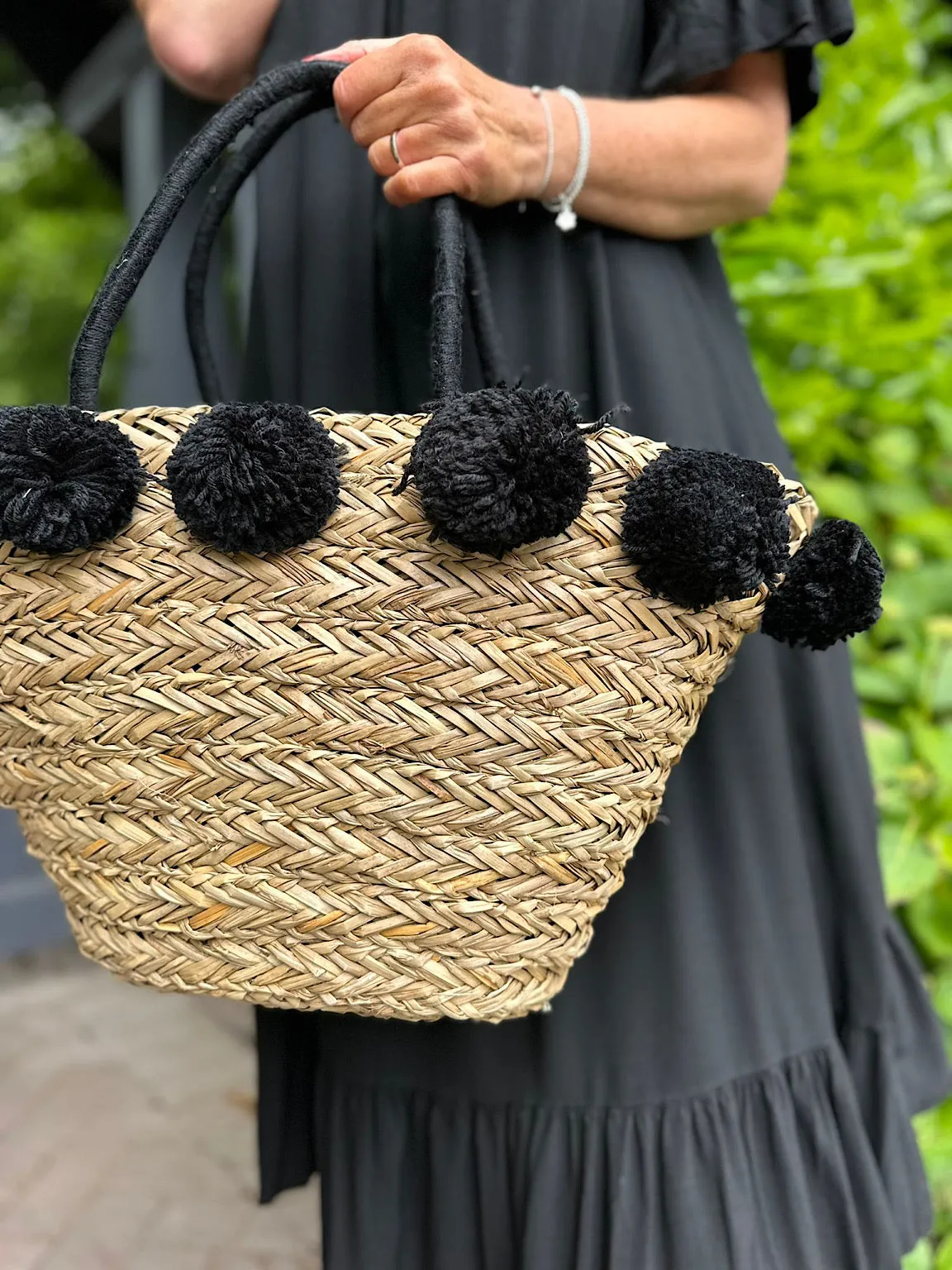 Black Pom Pom Weaved Straw Bag