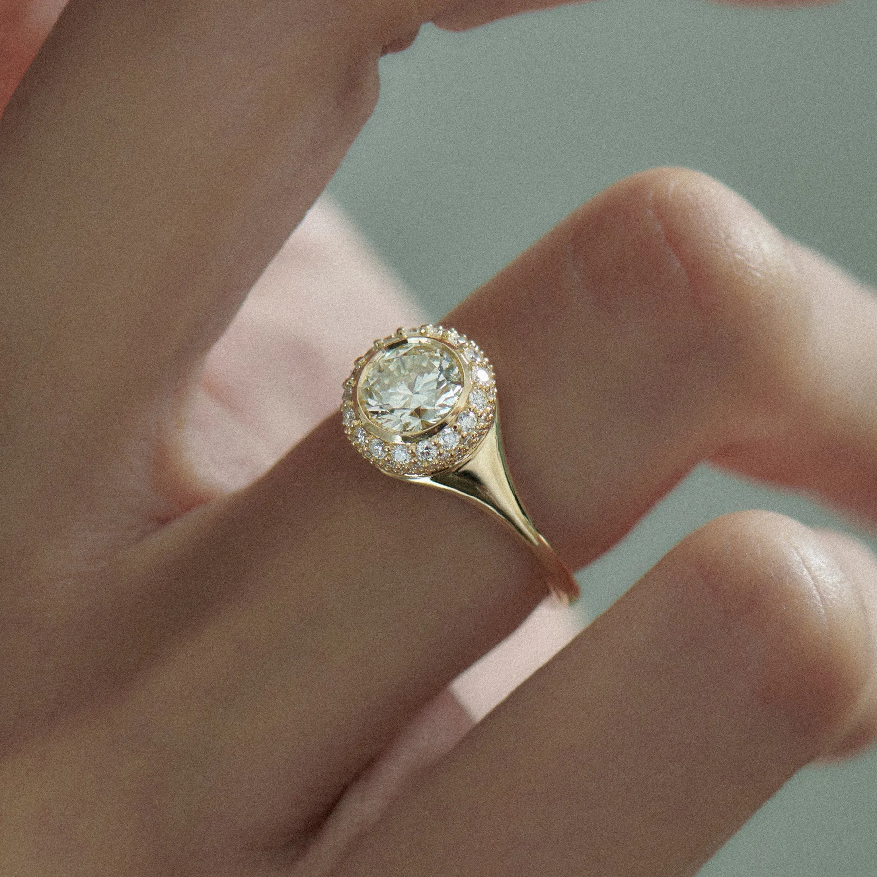 Orbed Brilliant Diamond & Gold Detail Engagement Ring