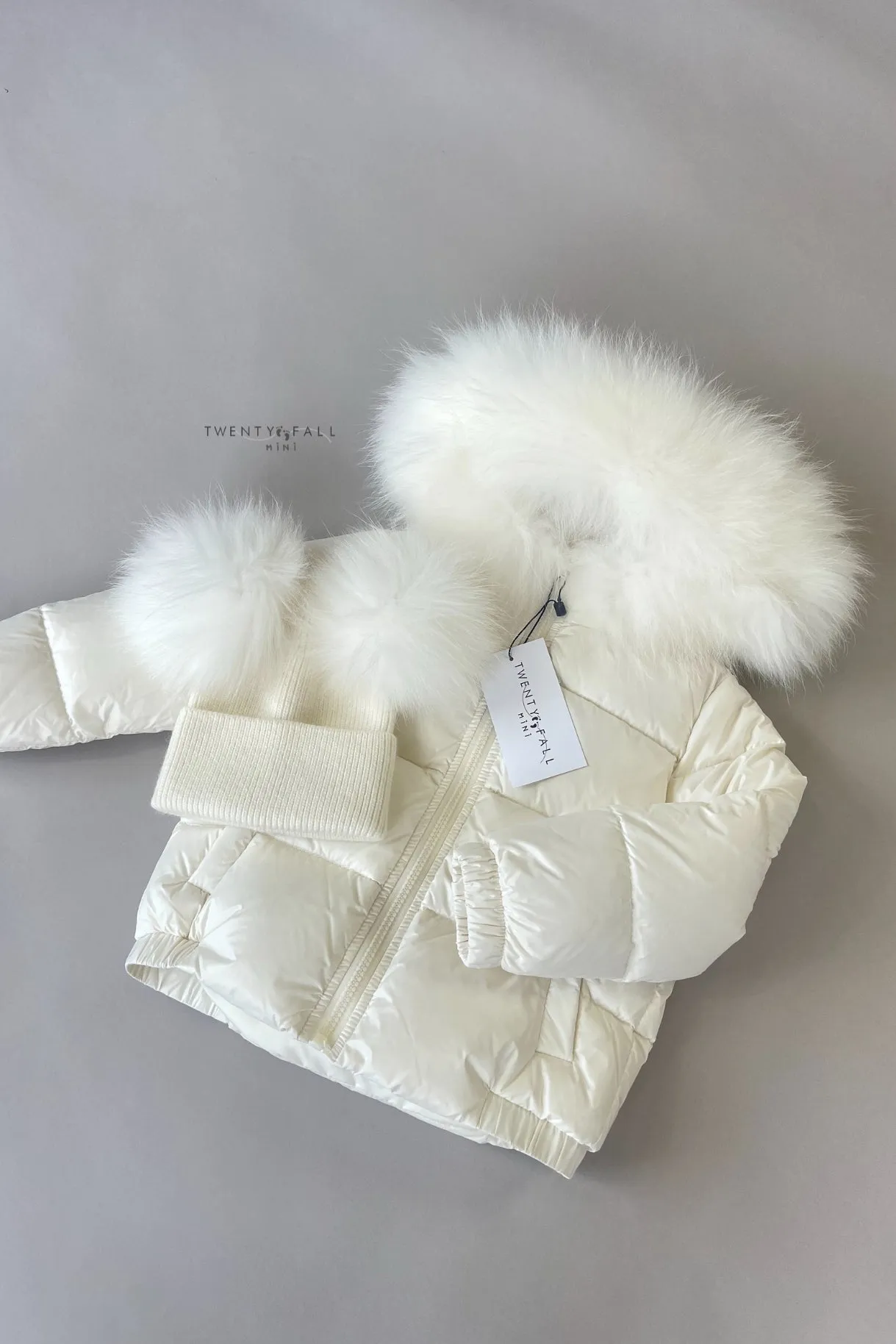 White Down Coat with Raccoon Fur Trim