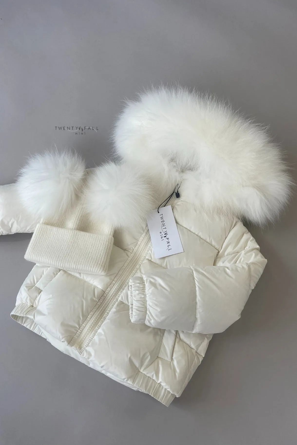 White Down Coat with Raccoon Fur Trim